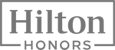 This is a logo for "Hilton Honors," a loyalty program by Hilton Hotels.